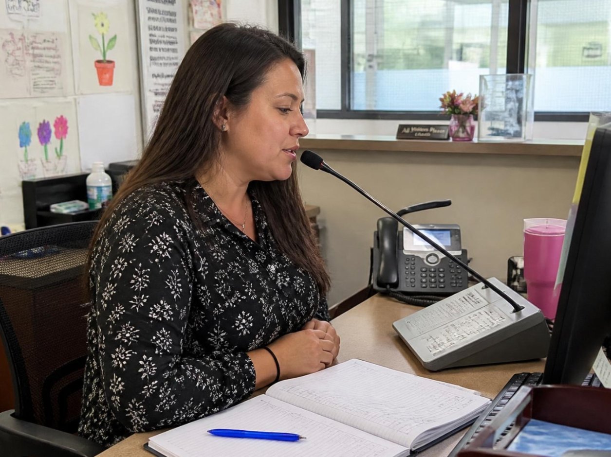 Administrator making a morning announcement